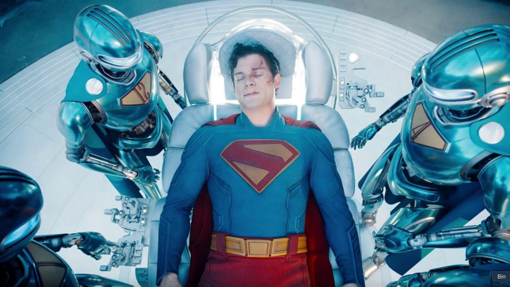 An injured Superman being tended to by the robots in the Fortress of Solitude.