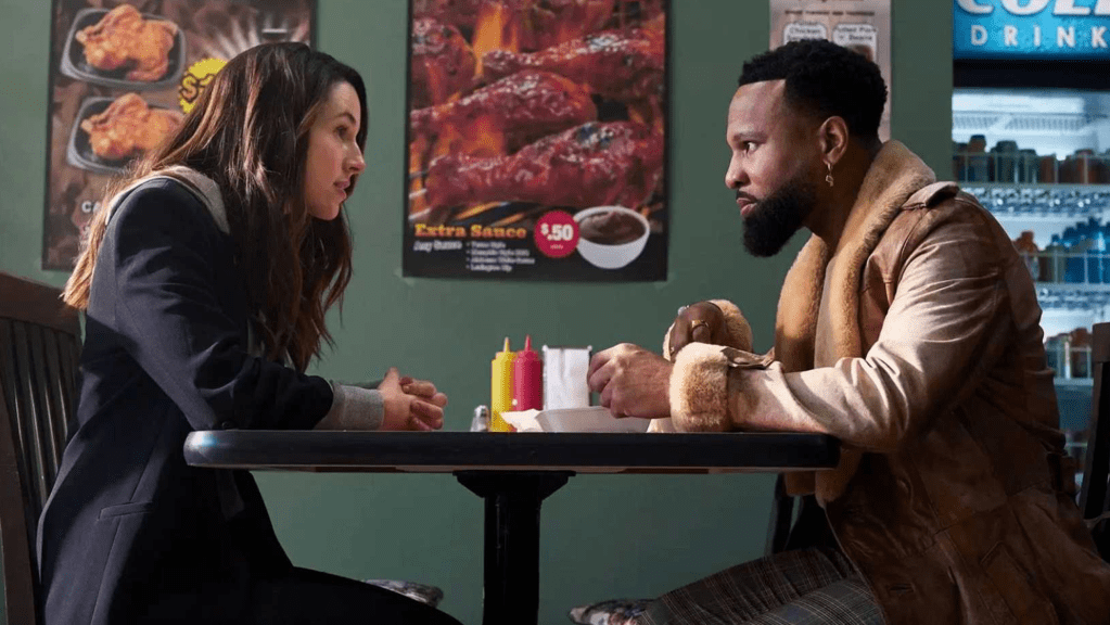 Alona Tal as Kayla and Johnny Ray Gill as Bobby Trey in Cross