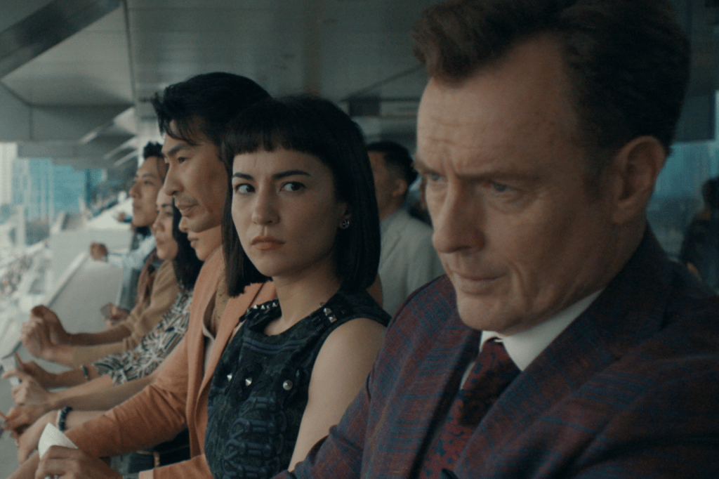 Chris Pang as Andrew Fung, Jessie Mei Li as Cola, and Toby Stephens as Christopher Hext in The Season, premiering on Disney+ and Hulu on June 17.