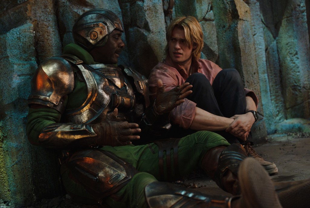 Idris Elba as Duncan/Man-at-Arms and Nicholas Galitzine as Adam in Masters of the Universe. (Photo courtesy of Amazon MGM Studios)