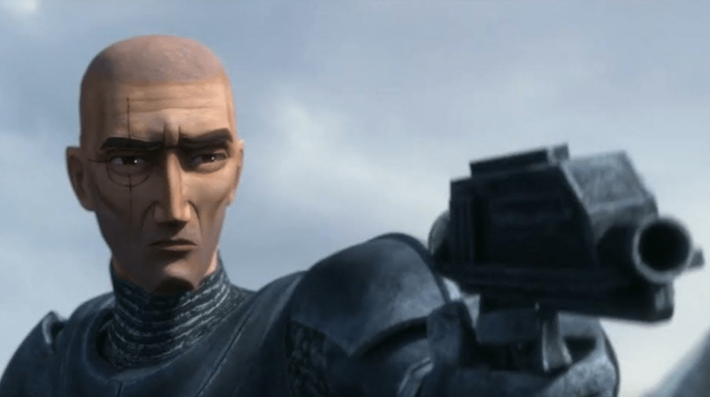 A close-up of a bald male character in a dark armored outfit, holding a futuristic gun and looking intensely towards the viewer.